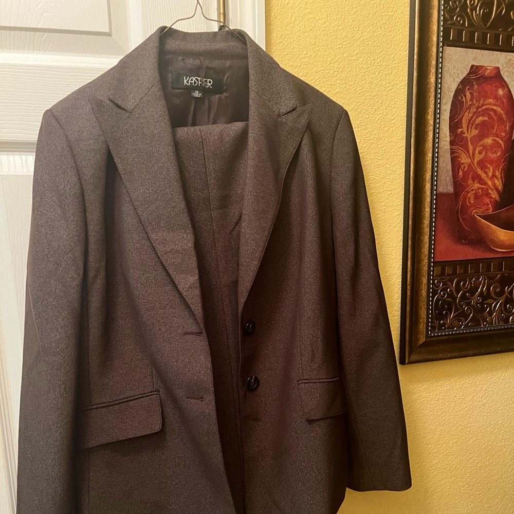 Gently used Kasper brown pantsuit size 14. Flare leg pants w/zipper & jacket